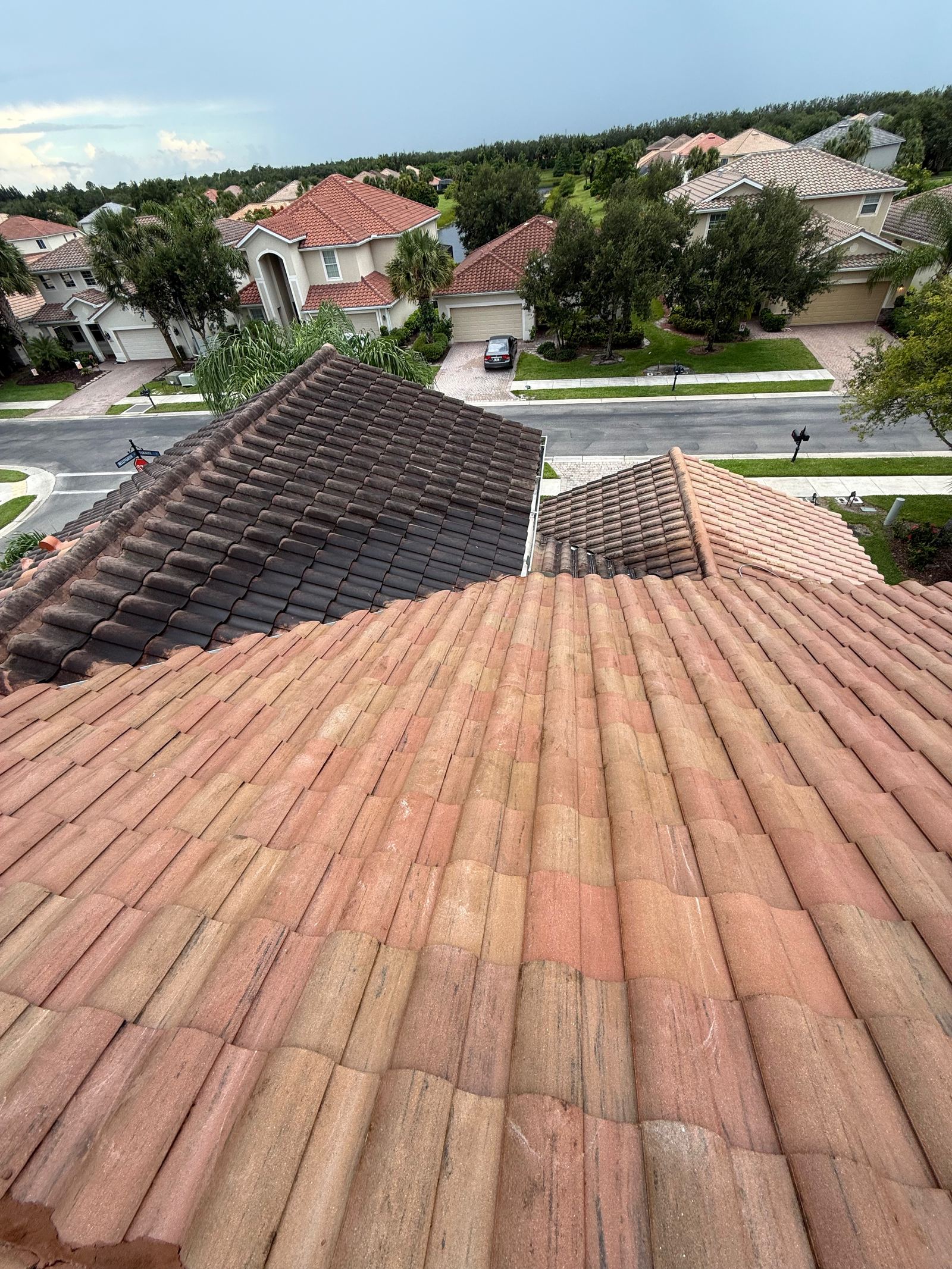 One slope cleaned next to a dirty adjacent slope on the same roof